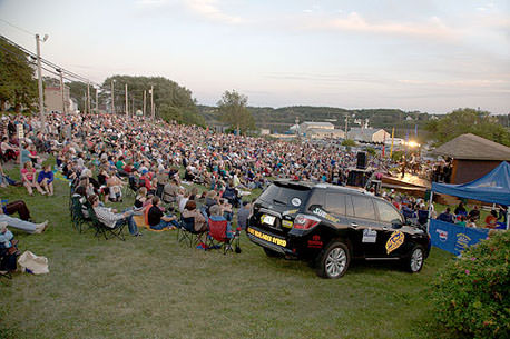 Large crowd of people enjoying the music